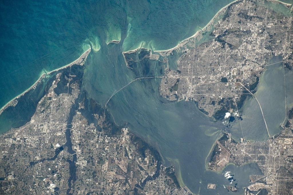 NASA Shares Photos Of Tampa Bay From Outer Space - Tampa, Florida, and its surrounding suburbs on Tampa Bay and the Gulf of Mexico are pictured from the International Space Station as it orbited 261 miles above the Sunshine State.